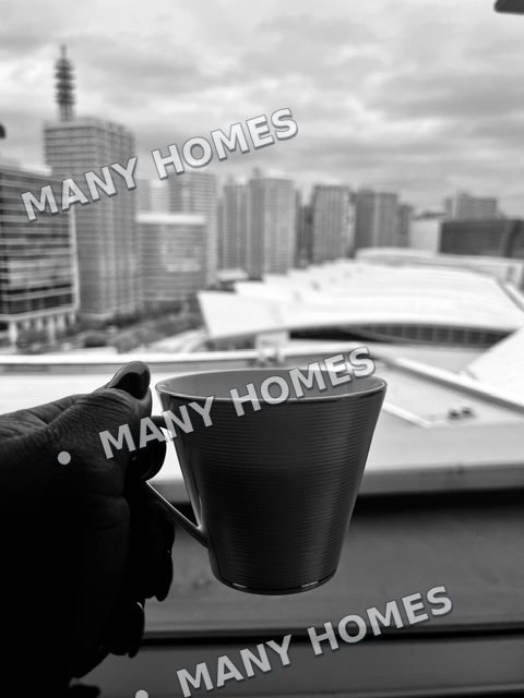 A cup of coffee overlooking the city.